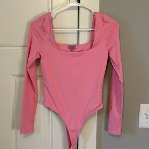 Francesca's Collections Pink Long Sleeve Bodysuit